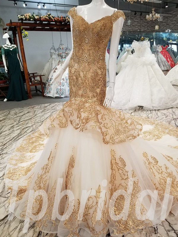 Gold mermaid wedding gown hotsell