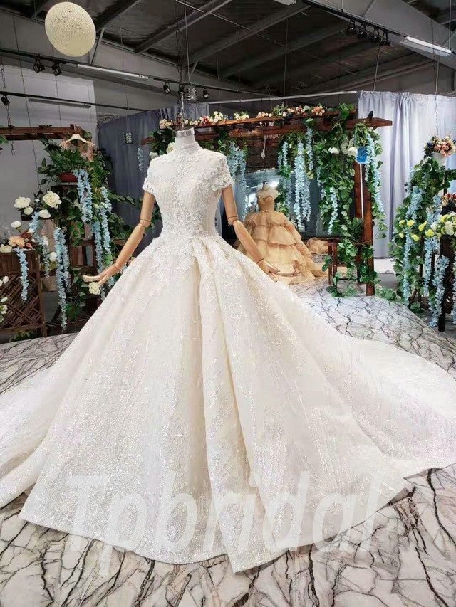 https://www.tpbridal.com/wp-content/uploads/2019/08/short-sleeve-wedding-dress-593-01.jpg