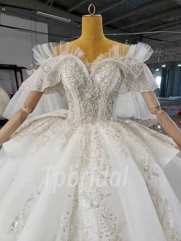 https://www.tpbridal.com/wp-content/uploads/2022/05/rhinestone-wedding-dress-1055-006.jpg